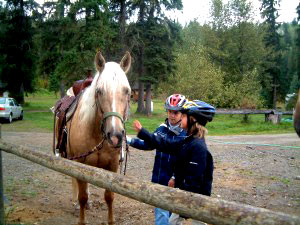 kids at ranch getting ready to go horseback riding